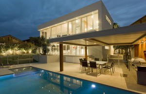 Modern backyard with swimming pool in Australian mansion